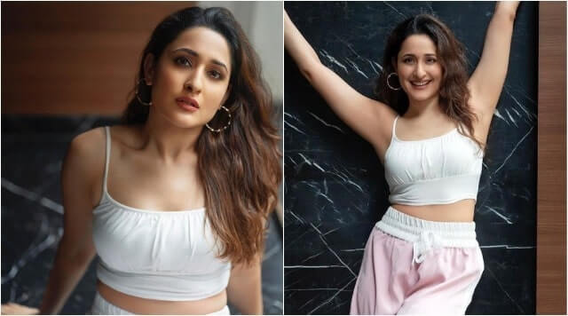 Pragya Jaiswal Goes All White As She Is Wearing Alluring Outfit For Latest Photoshoot.