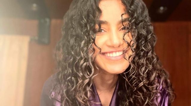 Anupama Parameswaran Looks Charming In Messy Curly Hair Look.