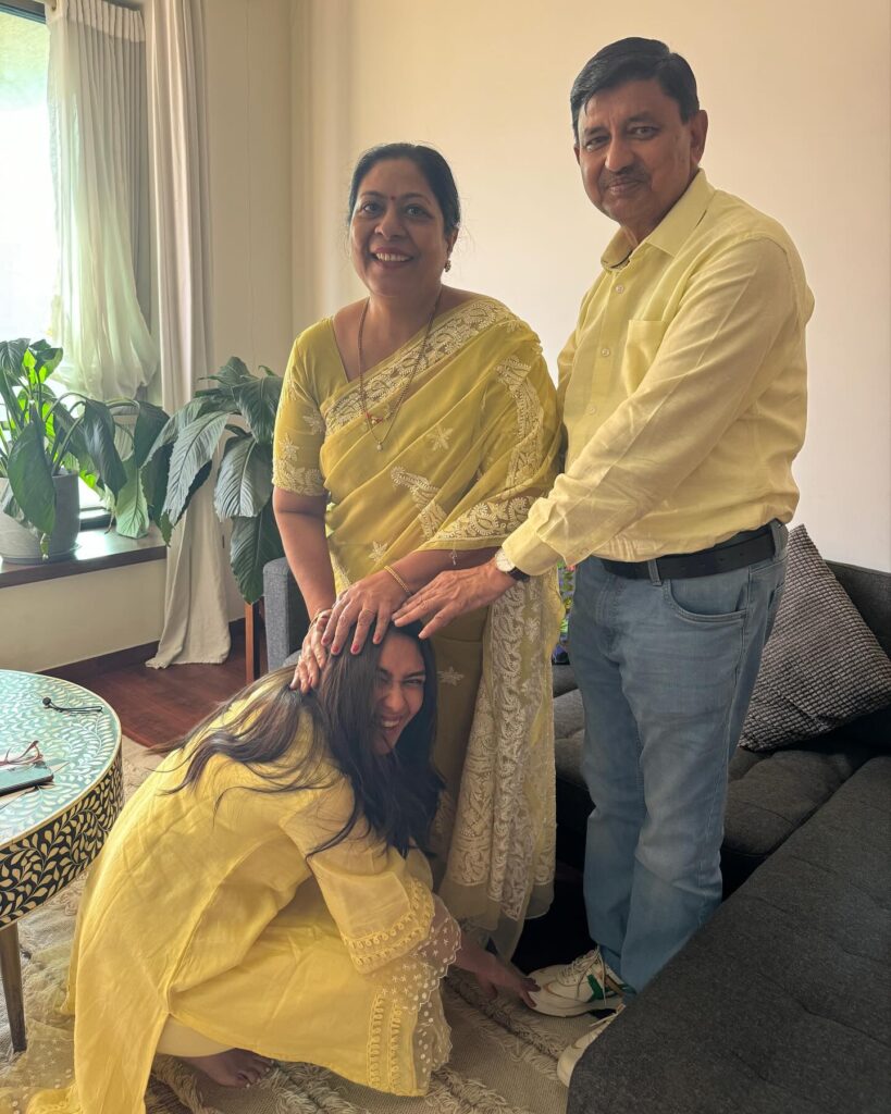 Mrunal thakur taking blessings on her parents