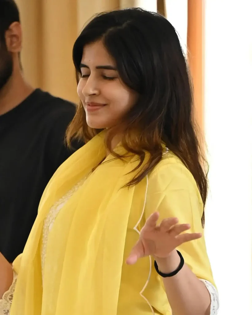 Sakshi in yellow dress