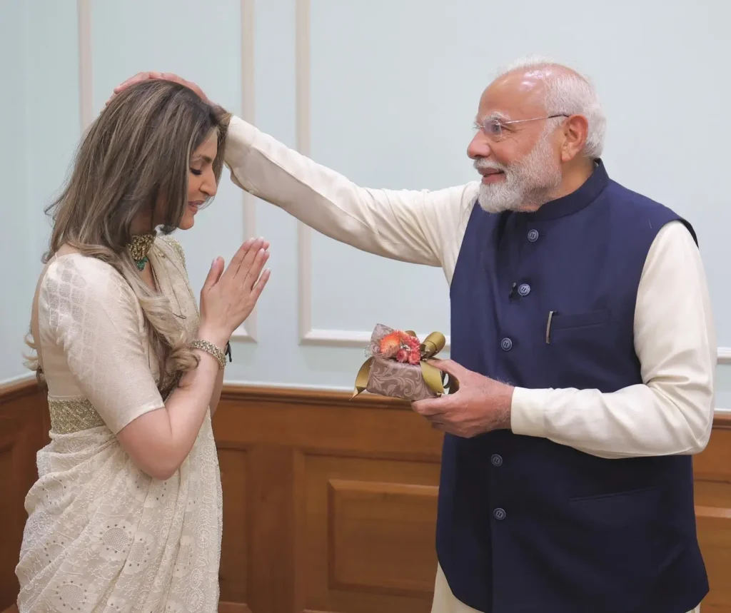 Riddhima Kapoor taking blessings of Narendra Modi